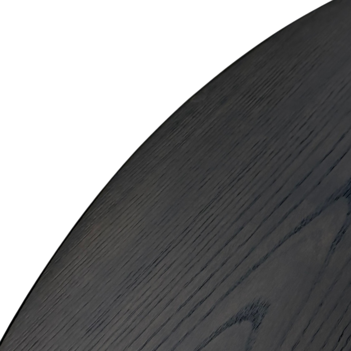 Close-up of dark brown oak grain across the round tabletop of the Altar Side Table.