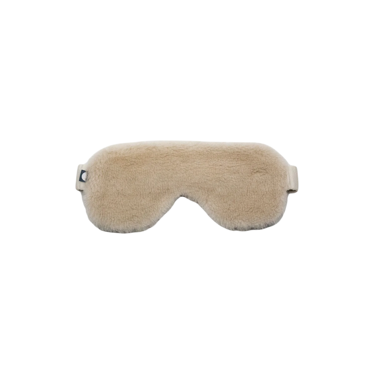 Merino Fleece Sleep Mask in sand beige with soft merino-blend fleece, contoured eye coverage and an adjustable strap for a comfortable, secure fit.