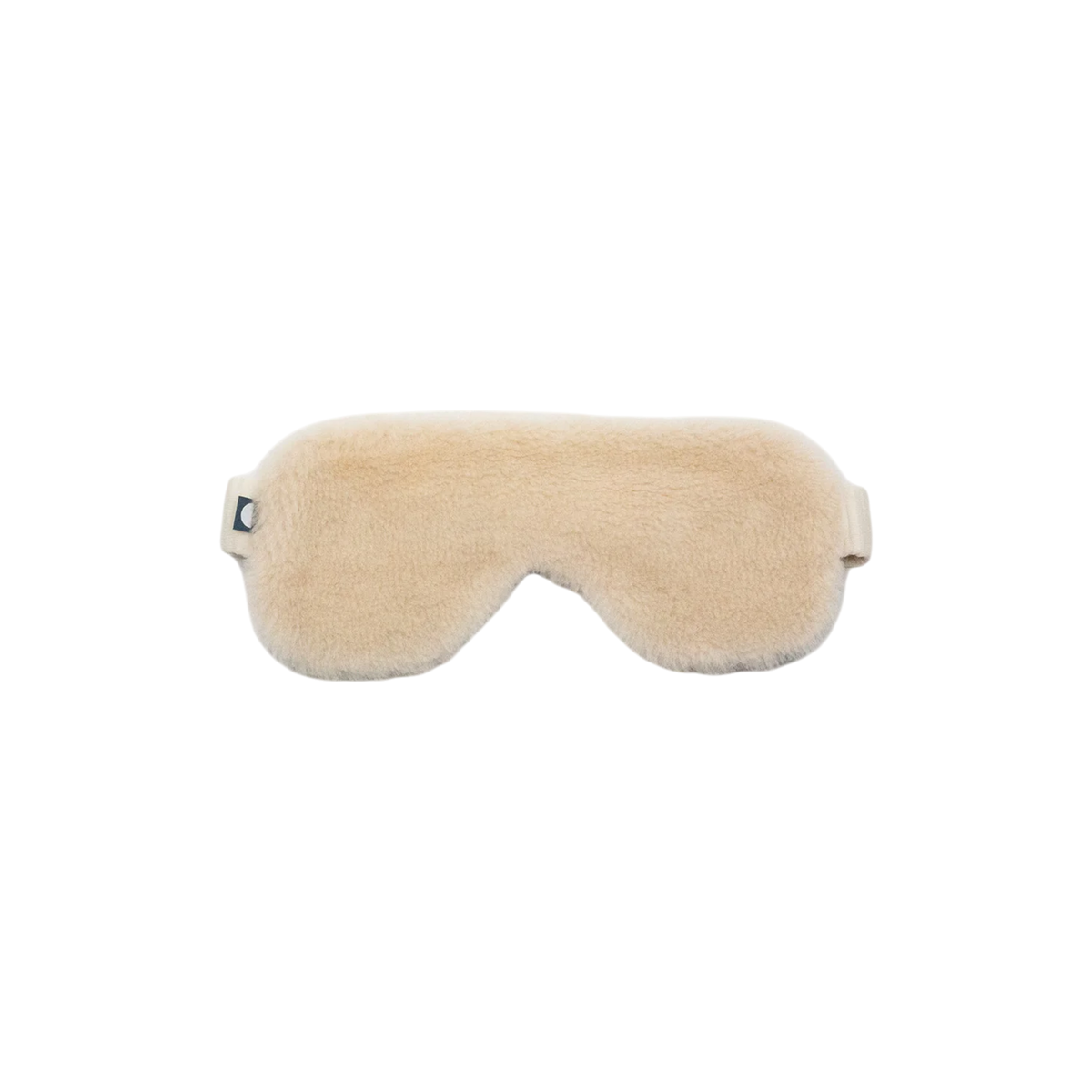 Merino Fleece Sleep Mask in soft ivory with plush merino-blend fleece, contoured eye coverage and an adjustable strap for a comfortable, secure fit.