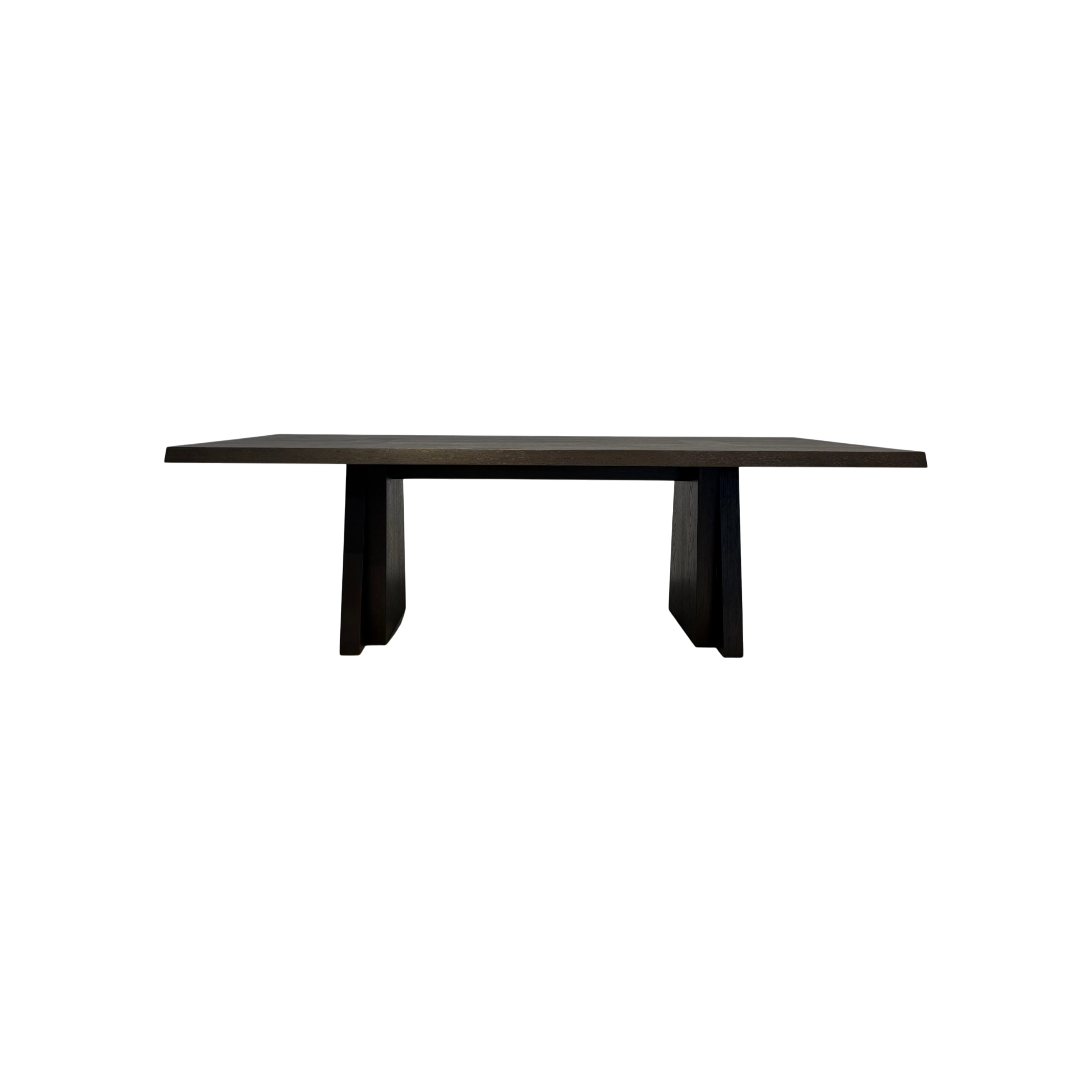 Oblique 120-inch Dining Table in dark wood with a long rectangular top and two angular trapezoidal pedestal bases.
