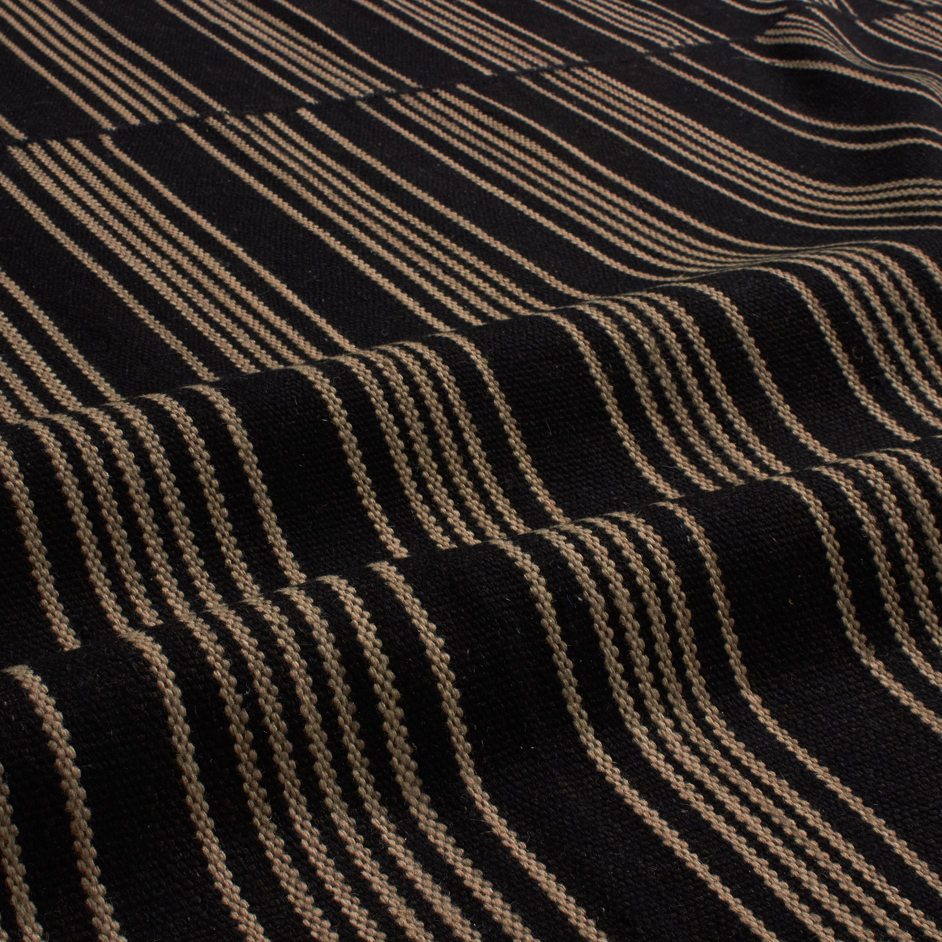 An homage to the quintessential Moroccan rug, ancient patterns are reimagined as bold, geometric forms.