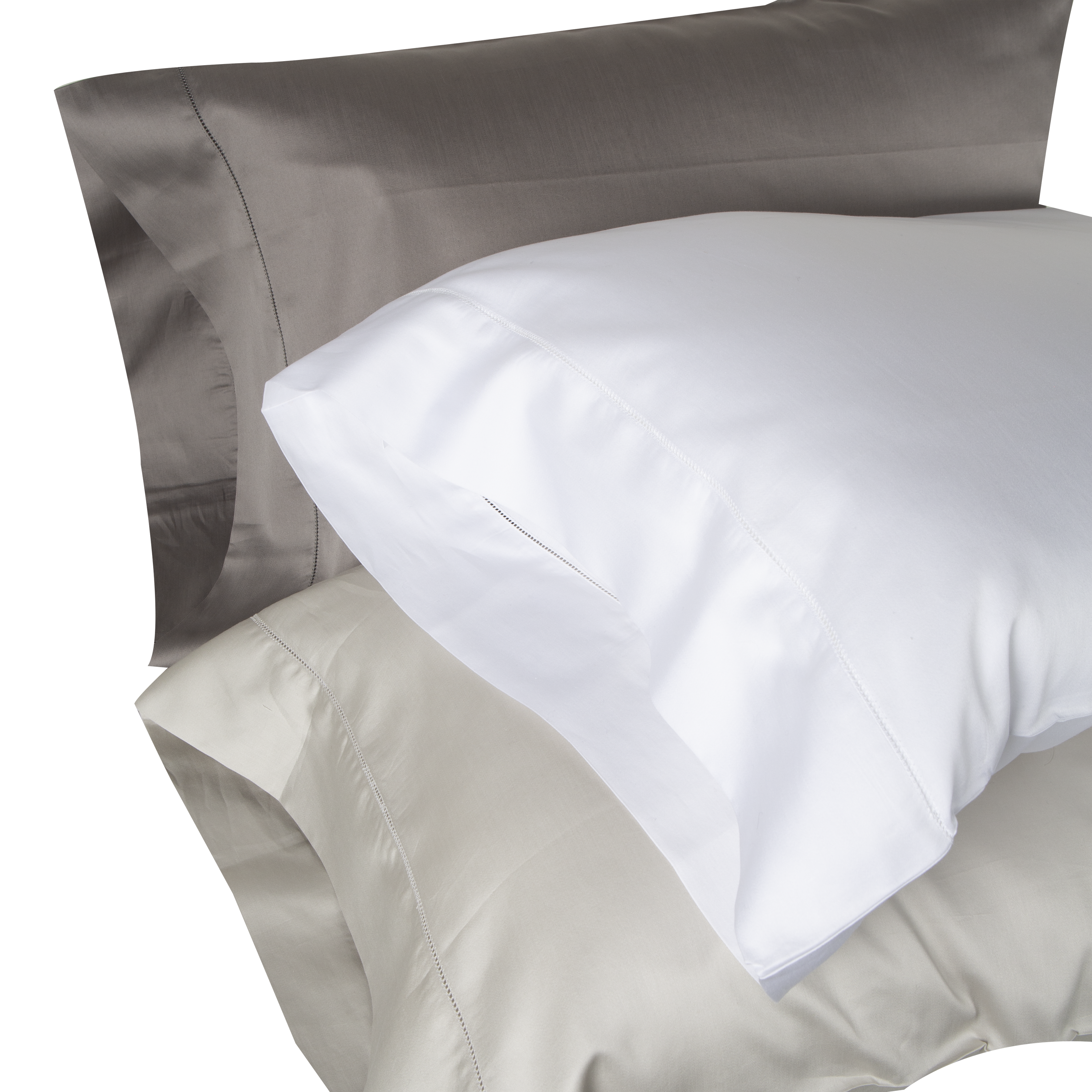 An elegant row of open hemstitching frames this silky, soft sateen collection.