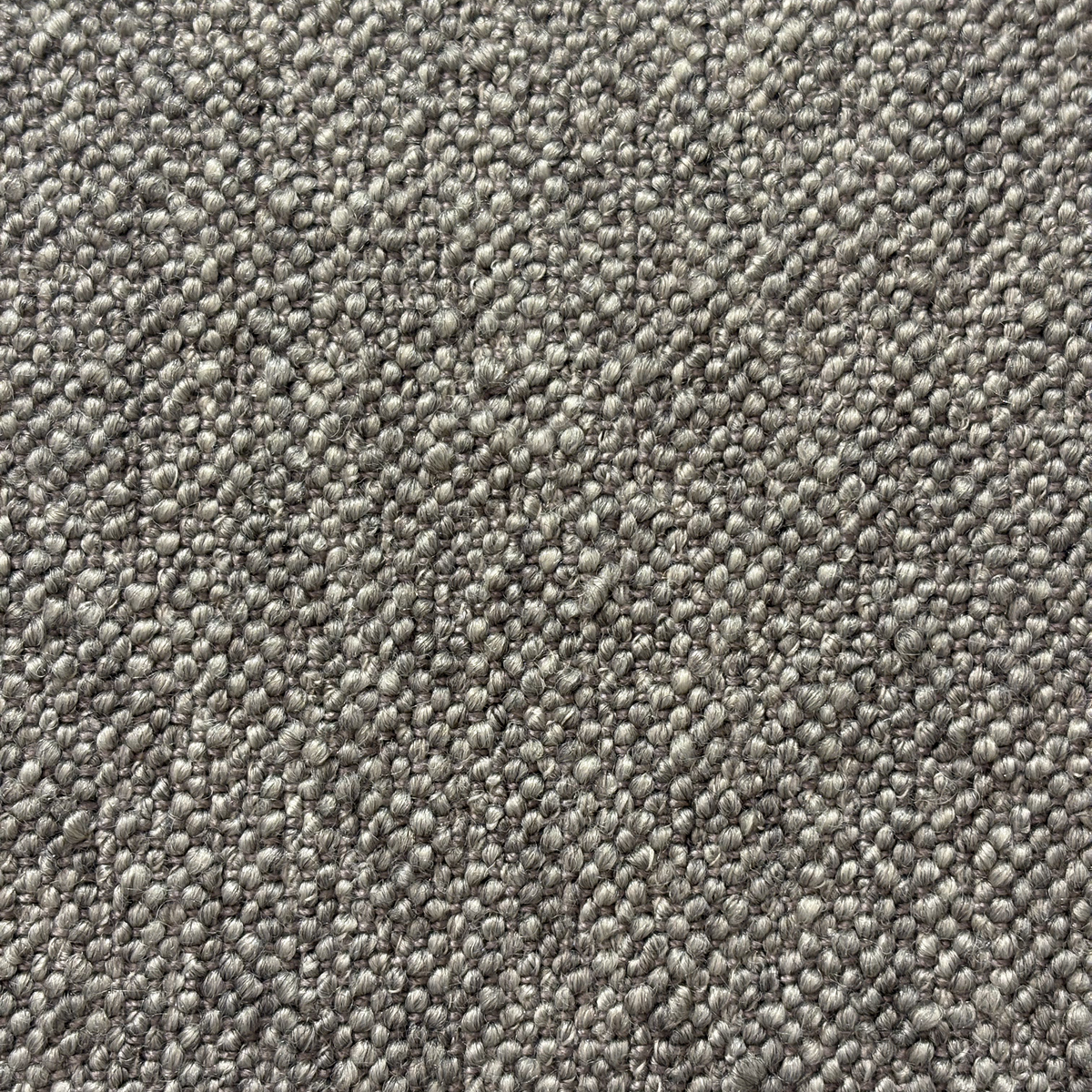 Vetro Modular Sectional Sofa fabric, extreme close-up showing the looped, pebbled heathered taupe weave with lighter yarn tips and deeper tones between the loops.
