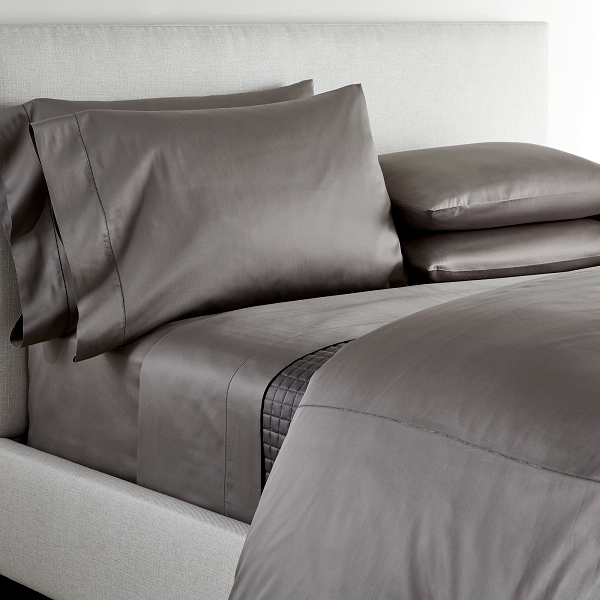 An elegant row of open hemstitching frames this silky, soft sateen collection.