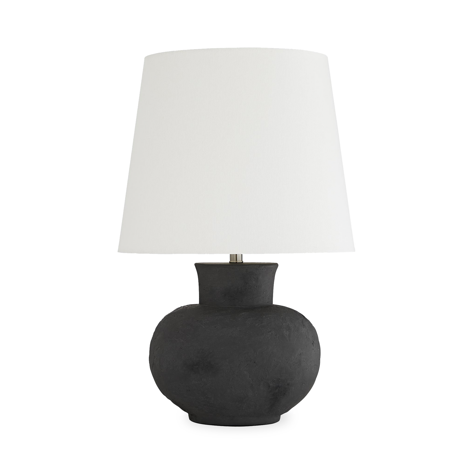 The stout stature and moody hue of this lamp delivers a distinct and dynamic element to a space.