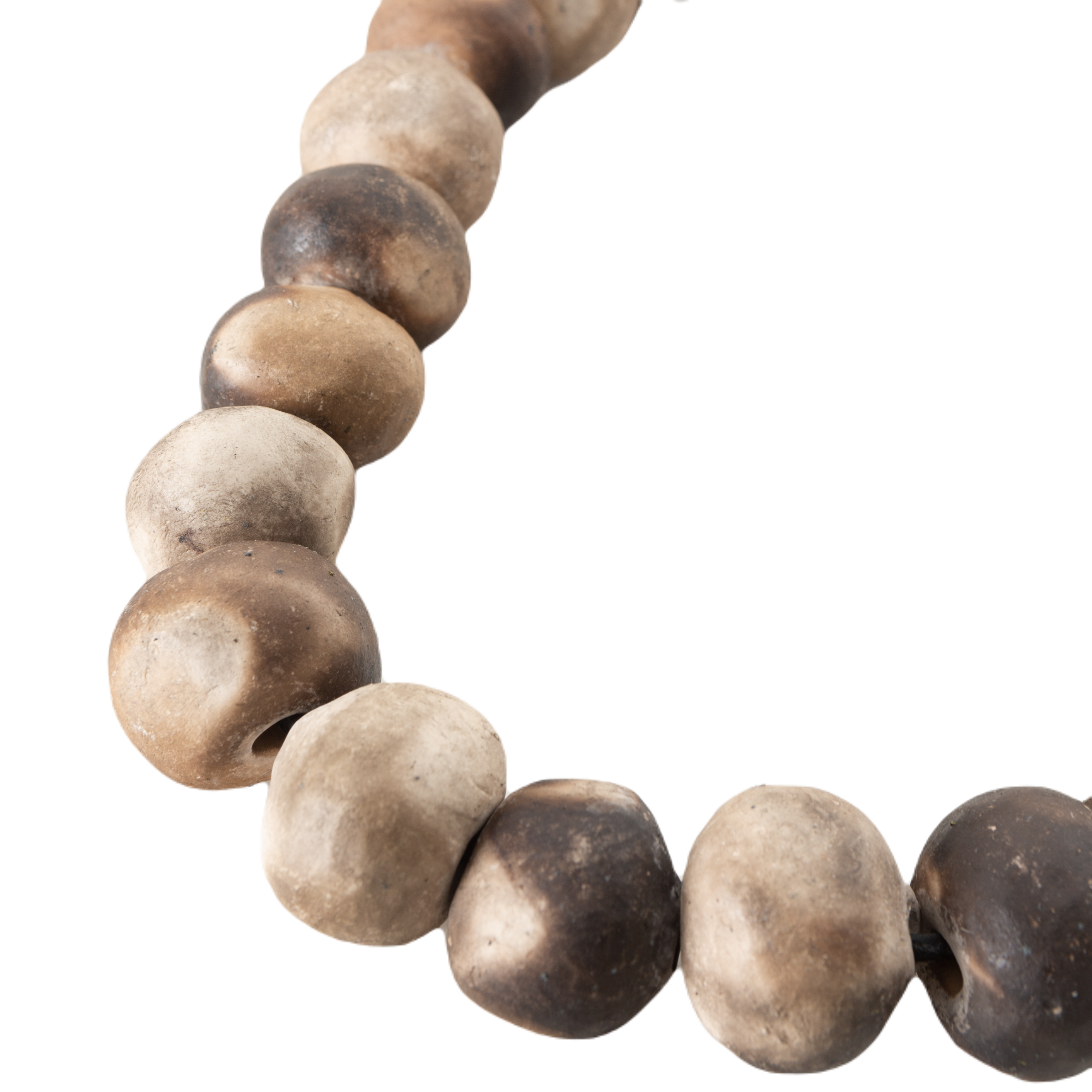 The Beaded Necklace is a beautiful piece that is handmade through a process that allows the ceramic beads to have unique natural colours and gradients.