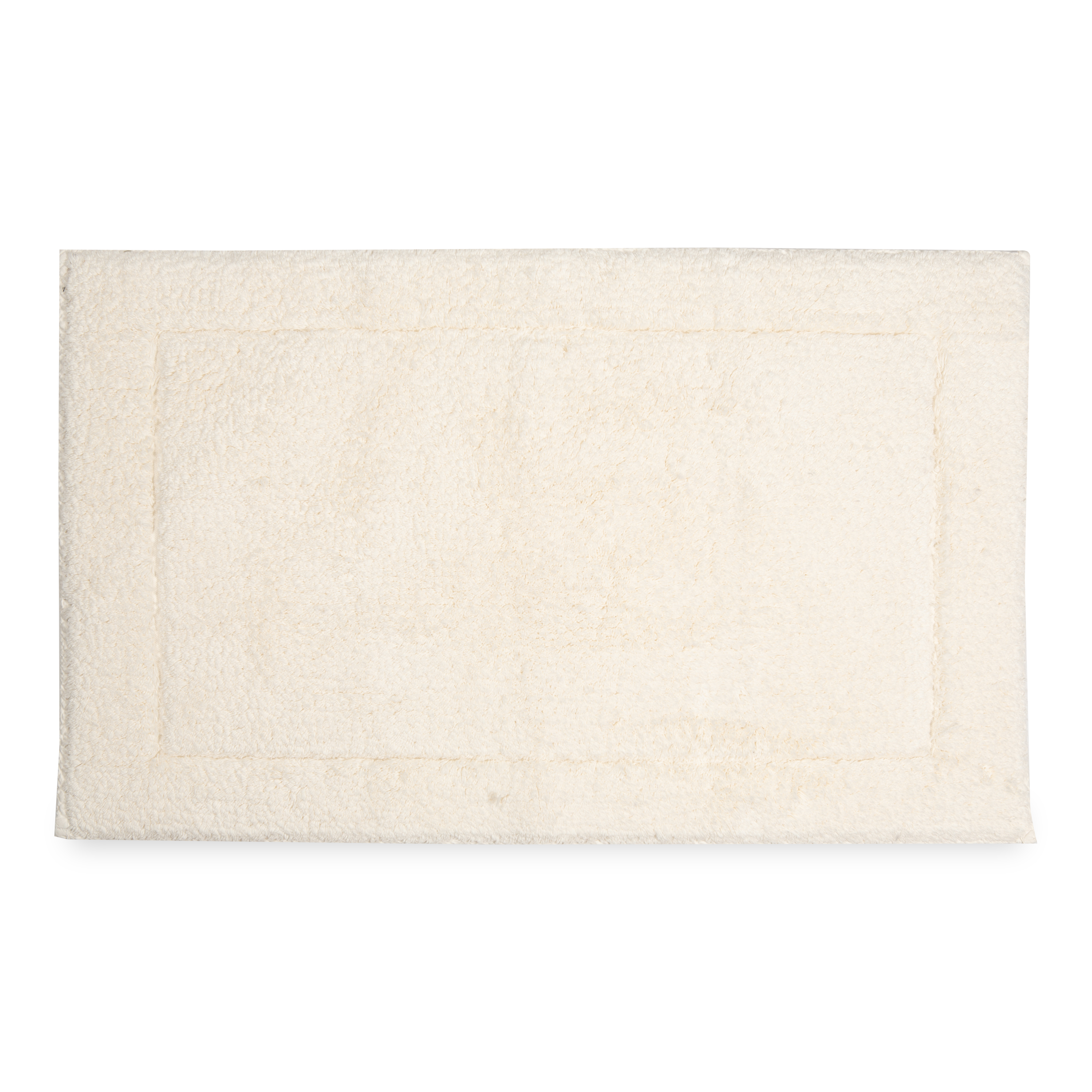 Crafted in a century-old mill in Portugal, this 100% cotton bath rug is fully reversible.