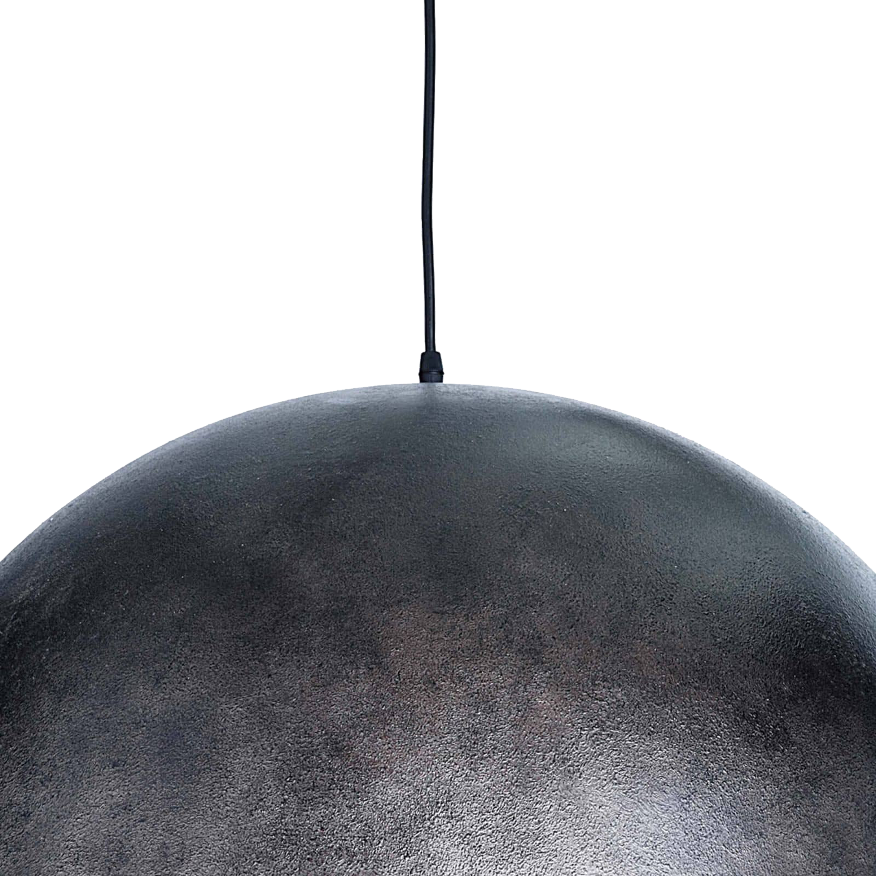A simple dome shade brings sleek minimalism to the mix.