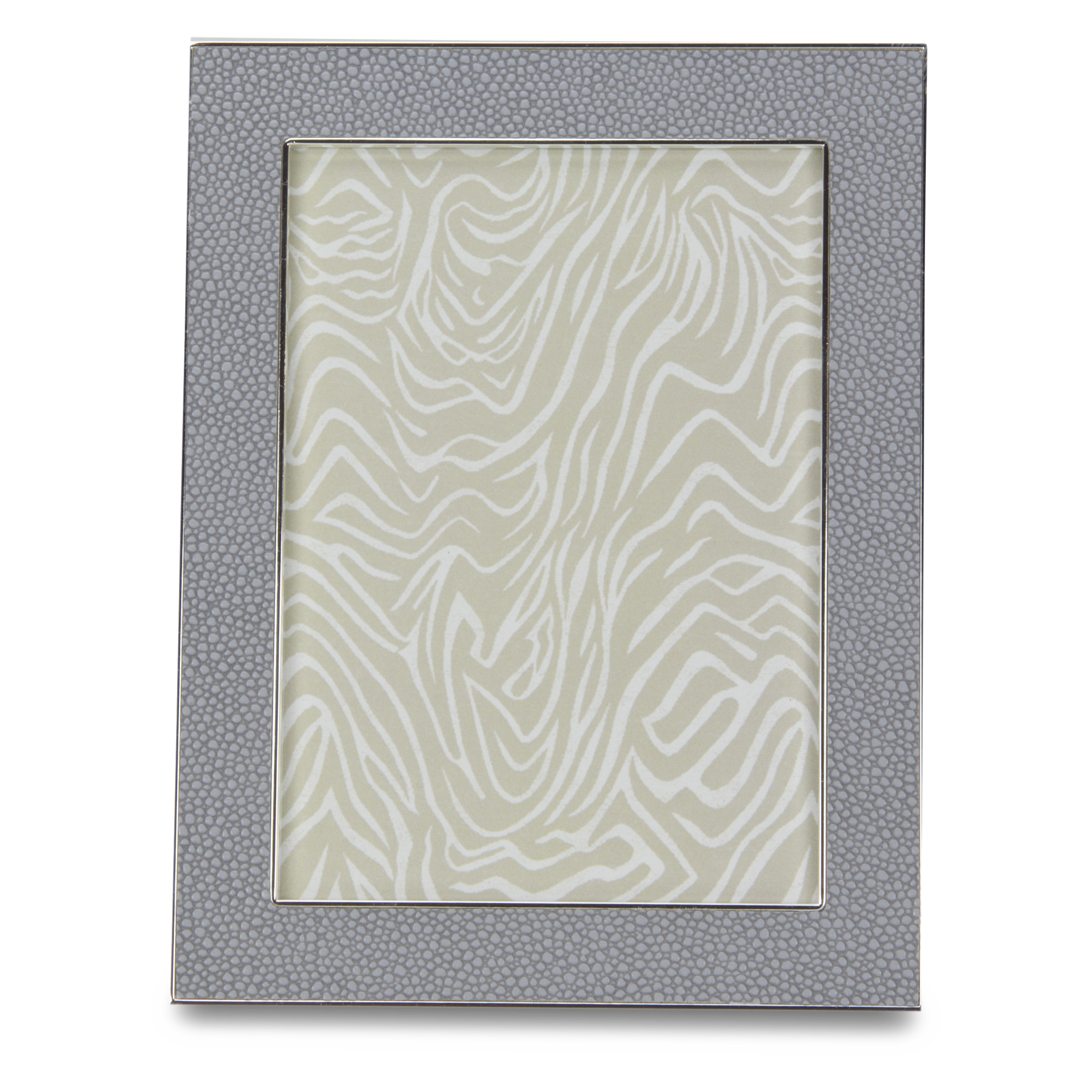A gorgeous grey faux shagreen picture frame capable of blending in with various décor styles.